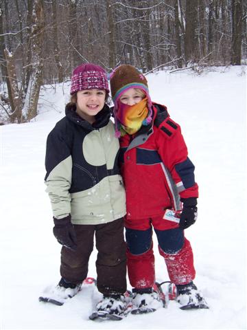 Two children on snowshoes
