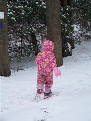 Girl snowshoeing