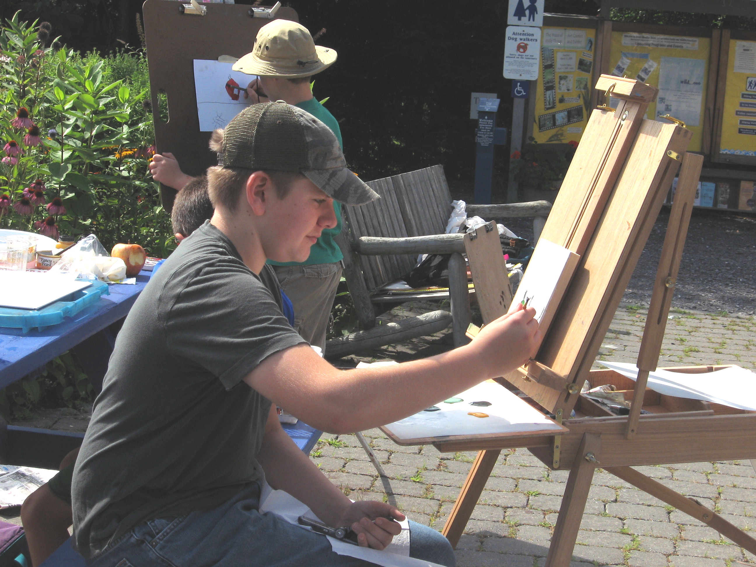 Young People Painting Outside