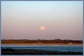 Moon rise over Allens Pond by Derik Newton